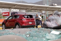 Viernes 15 de marzo del 2019. Tuxtla Gutiérrez. Negocios con destrozos y autos vandalizados después del operativo de desalojo del predio invadido en el libramiento norte