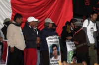 1 de enero del 2015. San Andrés Larrainzar. La delegación de padres de familia y compañeros de los normalistas de Ayotzinapa durante las celebraciones del aniversario del levantamiento  zapatista en el Caracol II de Oventik en la región de Los Altos del e