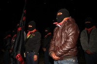 1 de enero del 2015. San Andrés Larrainzar. La delegación de padres de familia y compañeros de los normalistas de Ayotzinapa durante las celebraciones del aniversario zapatista en el Caracol II de Oventik