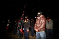 1 de enero del 2015. San Andrés Larrainzar. La delegación de padres de familia y compañeros de los normalistas de Ayotzinapa durante las celebraciones del aniversario zapatista en el Caracol II de Oventik