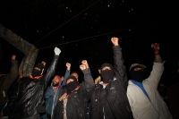 1 de enero del 2015. San Andrés Larrainzar. La delegación de padres de familia y compañeros de los normalistas de Ayotzinapa durante las celebraciones del aniversario zapatista en el Caracol II de Oventik