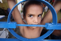 Julio del 2014. Tapachula de Córdoba y Ordoñez. Los Niños Hondureños. Después de vivir el éxodo ocasionado por la violencia en Honduras, acosados y perseguidos por los mareros, continúan el camino hacia el norte intentando olvidar la venganza que sus jóve