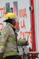 Mayo del 2015. Tuxtla Gutiérrez. Durante la jornada de incendios de edificios de partidos políticos del Movimiento Magisterial.