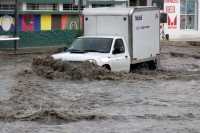 Viernes 14 de julio del 2017. Tuxtla Gutiérrez. Encharcamientos en varias vialidades son reportadas en el centro de la capital chiapaneca después de la lluvia de esta tarde.