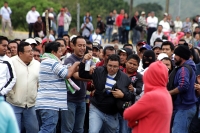 Martes 8 de diciembre del 2015. Tuxtla Gutiérrez. Elementos de la Policía Federal resguardan las entradas de la Escuela Nacional de Protección Civil en donde se lleva a cabo el Examen de Evaluación a los Docentes en Chiapas, donde después de enfrentarse u