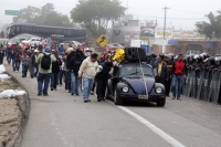 Martes 8 de diciembre del 2015. Tuxtla Gutiérrez. Elementos de la Policía Federal resguardan las entradas de la Escuela Nacional de Protección Civil en donde se lleva a cabo el Examen de Evaluación a los Docentes en Chiapas, donde después de enfrentarse u