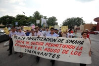 Lunes 29 de julio del 2013. Tuxtla Gutiérrez. Tres ex presidentes municipales Tuxtlecos marchan esta tarde para protestar en contra de la privatización del SMAPA.