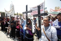 Jueves 26 de marzo del 2015. Tuxtla Gutiérrez. El Sacerdote Marcelo Pérez, párroco de Simojovel, al término de la peregrinación de 4 días por la paz que realiza el pueblo creyente y organizaciones sociales hacia la capital de de Chiapas