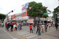 Miércoles 9 de agosto del 2017. Tuxtla Gutiérrez. Militante de colonos del oriente norte de Tuxtla cierran el cruce de la Avenida y Calle Central este medio día.