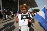 Martes 26 de julio. Familiares de migrantes en transito hacia los EEUU y de desaparecidos centroamericanos marchan entre la frontera entre las ciudad Gautemalteca Tecum Uman y Ciudad Hidalgo del municipio de Tapachula, Chiapas en la Caravana Paso a Paso p