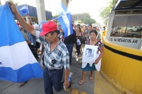 Martes 26 de julio. Familiares de migrantes en transito hacia los EEUU y de desaparecidos centroamericanos marchan entre la frontera entre las ciudad Gautemalteca Tecum Uman y Ciudad Hidalgo del municipio de Tapachula, Chiapas en la Caravana Paso a Paso p
