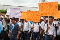 Lunes 4 de septiembre del 2017. Tuxtla Gutiérrez. Elementos policiacos resguardan las calles de la ciudad mientras que los comuneros de Nicolás Ruí­z marchan sobre la Avenida Central y se manifiestan bloqueando las calles del primer cuadro de la ciudad.
