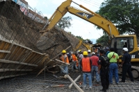 Lunes 13 de Junio del 2011 Cuatro obreros fallecen sepultados  en la construcción en los muros de contención del rió sabinal que su ubica en la 4 norte esquina con 10 oriente.