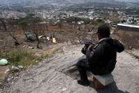Viernes 15 de marzo del 2019. Tuxtla Gutiérrez. Negocios con destrozos y autos vandalizados después del operativo de desalojo del predio invadido en el libramiento norte