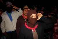 1 de enero del 2015. San Andrés Larrainzar. La delegación de padres de familia y compañeros de los normalistas de Ayotzinapa durante las celebraciones del aniversario zapatista en el Caracol II de Oventik