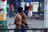 Sábado 24 de noviembre del 2018. Tuxtla Gutiérrez. Elementos de las corporaciones policiacas repliegan los disturbios en el centro de la ciudad durante el último informe del gobierno chiapaneco de Manuel Velazco Coello este medio dí­a.