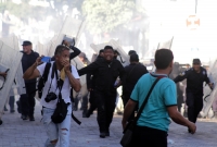 Sábado 24 de noviembre del 2018. Tuxtla Gutiérrez. Elementos de las corporaciones policiacas repliegan los disturbios en el centro de la ciudad durante el último informe del gobierno chiapaneco de Manuel Velazco Coello este medio dí­a.