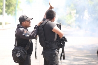 20210531. Tuxtla G. Continúan los enfrentamientos entre normalistas y las corporaciones policiacas de Chiapas