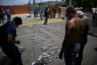 20210531. Tuxtla G. Continúan los enfrentamientos entre normalistas y las corporaciones policiacas de Chiapas