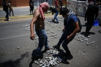 20210531. Tuxtla G. Continúan los enfrentamientos entre normalistas y las corporaciones policiacas de Chiapas