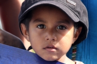 Julio del 2014. Tapachula de Córdoba y Ordoñez. Los Niños Hondureños. Después de vivir el éxodo ocasionado por la violencia en Honduras, acosados y perseguidos por los mareros, continúan el camino hacia el norte intentando olvidar la venganza que sus jóve