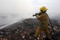 Foto: Juan Carlos Calderón. Tapachula de Ordoñez, Chiapas. El humo provocado por el incendio del basurero municipal ubicado a 15 kilómetros de Tapachula continua afectando a la población de las comunidades cercanas.
