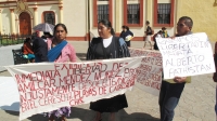 Miércoles 14 de diciembre. Familiares de presos se manifiestan en la plaza de la paz.