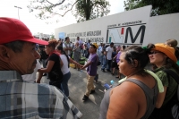Los familiares de los migrantes desaparecidos en el transito a los EEUU realizan una protesta simbólica en las instalaciones de INM de la ciudad de Tapachula durante la Caravana Paso a Paso para la Paz este medio día.