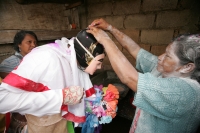 La ceremonia del Baño del Zapoyol, es realizada durante el cierre del Carnaval de la ciudad de Coita donde los participantes mojan su cabeza en agua preparada con cal y perfumes para luego colocar confetti en la cabeza, se bebe aguardiente antes y después