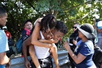 20241105. Tuxtla. Abigail es una joven migrante que sufre por problemas de sald durante la caravana de migrantes que sale esta mañana de la capital de Chiapas